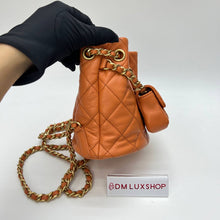 Load image into Gallery viewer, Chanel 23A Orange Bucket Backpack
