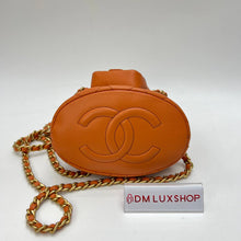 Load image into Gallery viewer, Chanel 23A Orange Bucket Backpack
